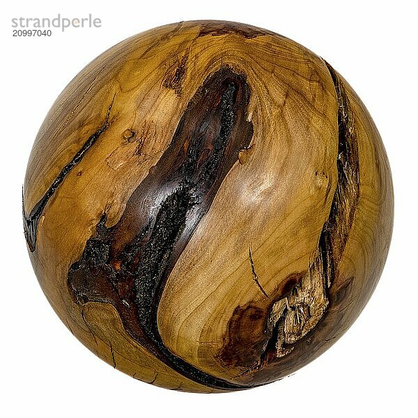 Turned dark brown ball made of wood with bark inclusions set free on white