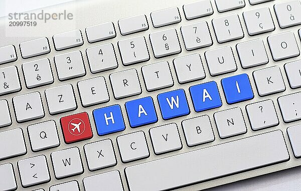 HAWAI writing on white keyboard with a aircraft sketch