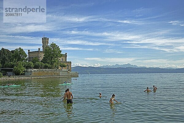 Bathers in the water on the shore  Montfort Castle  lake  bathing  bathing guest  kayaker  lake  view  landscape  mountains  mountains  Langenargen  Obersee  Lake Constance  Lake Constance area  Baden-Württemberg  Germany  Europe