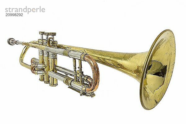 Old rusty trumpet with dents and scratches painted on white