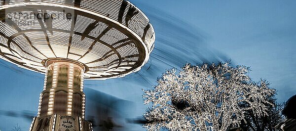 Gothenburg  Sweden  November 29 2014: Chair swing ride at Liseberg amusement park at night  Europe