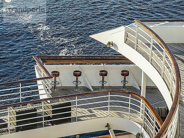 Close-up of chairs and ceiling elements on a ship over the blue sea  stockholm  baltic sea  sweden  scandinavia