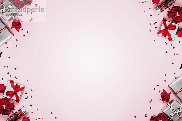 Saint Valentine Day or Mothers day card template  greeting or invitation flat lay for wedding. Top view on pink background with paper gift boxes with red ribbons decorated with heart confetti  shapes