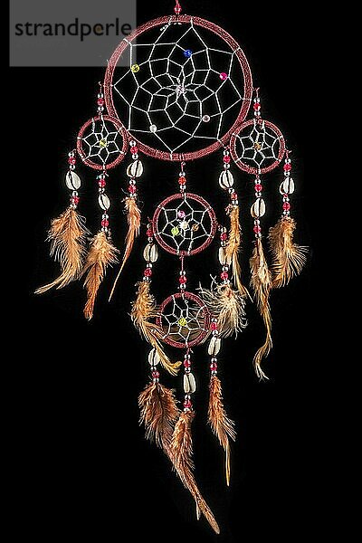 Beaded dreamcatcher with colourful feathers and beads against a black background