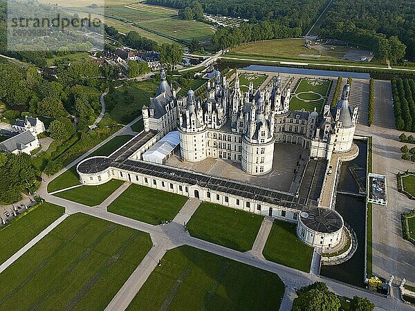 Aerial view of a magnificent historic castle from above. The surroundings are green and well-kept  aerial view  Chambord Castle  Château de Chambord  Loire Castle  Loire Valley  Loir-et-Cher Department  Centre Region  France  Europe