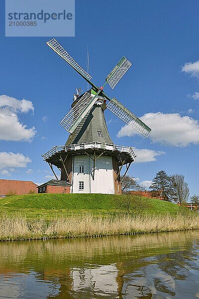 The western of the twin mills of Greetsiel at the Greetsieler Sieltief  Krummhörn  East Frisia  Lower Saxony  Germany  Europe