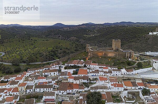 Mertola drone aerial view of the city and landscape with Guadiana river and medieval historic castle on the top in Alentejo  Portugal  Europe