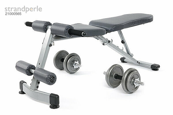 Exercise bench and dumbbells. Gym equipment isolated on white background