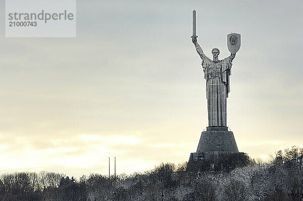 Travel stock photo of Mother Land statue of liberty and peace in Kiev Ukraine Wintertime scenic