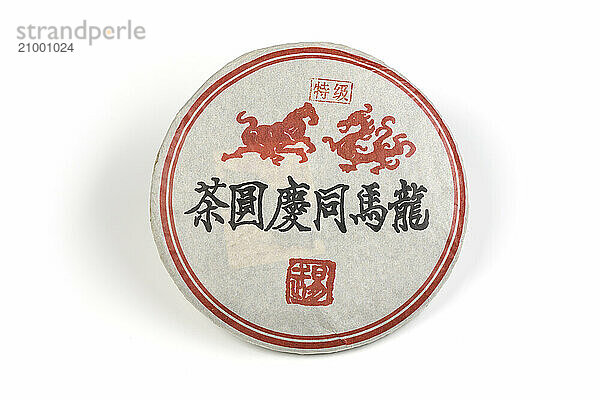 Puer or Pu-erh  fermented Chinese black tea in packaging isolated on white