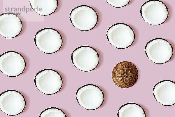 Coconut pattern on the pink background. Set of coconut halves.