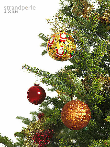 Colorful ornament on a Christmas tree isolated on white background