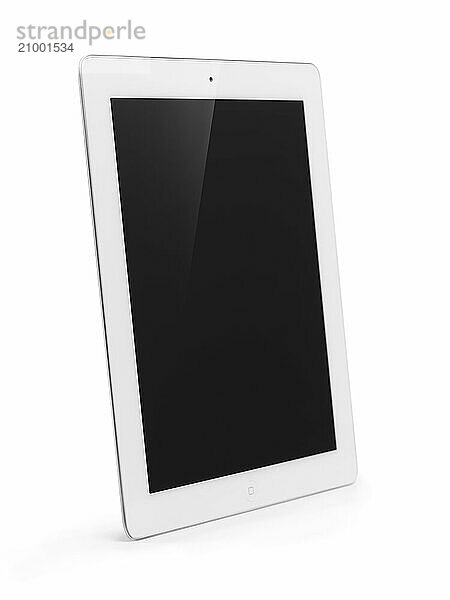 White Apple iPad 2 tablet computer with blank display. Isolated with clipping path on white background