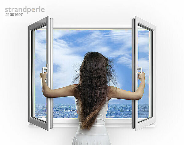 Young woman opening a window with a view on the sea  concept isolated on white background