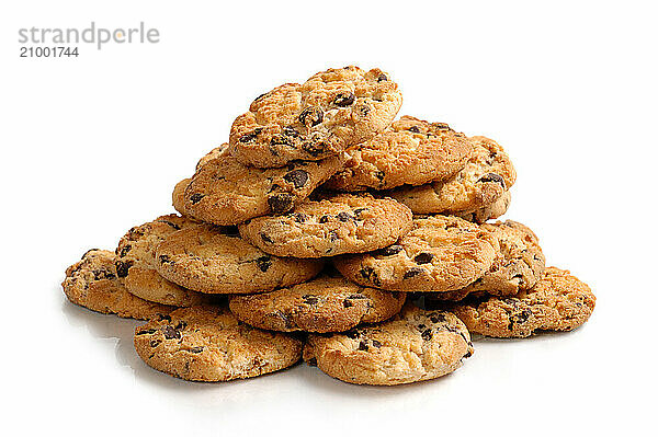 Pile of appetizing chocolate chip cookies. Isolated on white background