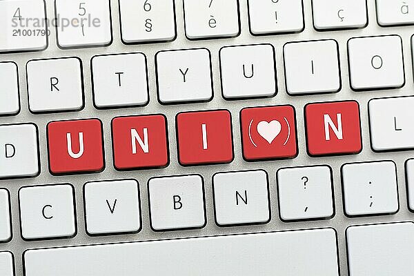 UNION writing on white keyboard with a heart sketch with parenthesis