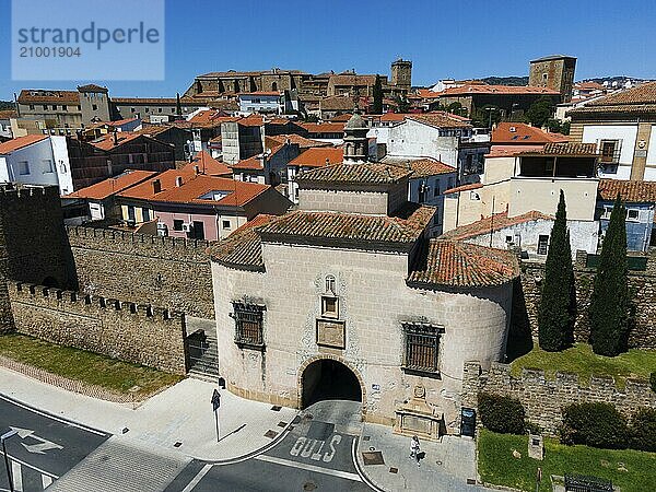 Historic city with a fortified entrance gate and a well-preserved city wall  surrounded by old buildings with red roofs  aerial view  Puerta de Trujillo  city gate  Plasencia  Cáceres  Caceres  Extremadura  Spain  Europe