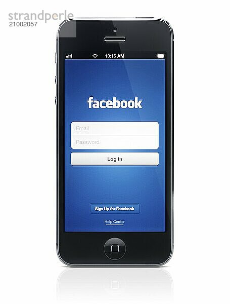 Facebook app welcome screen on display of Apple iPhone 5. Isolated on white background with clipping path