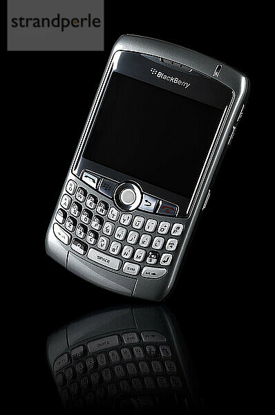 BlackBerry 8310 Curve stylish smartphone Isolated silhouette on black background