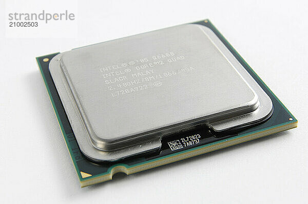 Intel Core 2 Quad Q6600 CPU Quad core computer processor closeup isolated on white