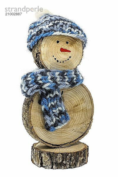 Handmade snowman made from wooden discs  with crocheted hat and scarf on a white background