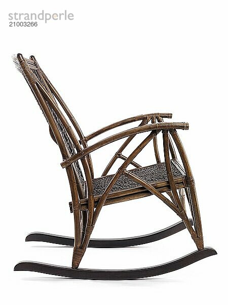 Antique wooden rocking chair side view isolated on white background