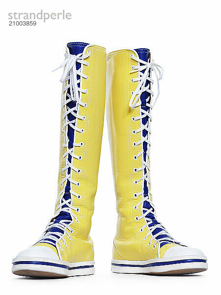 Big yellow boots isolated on white background