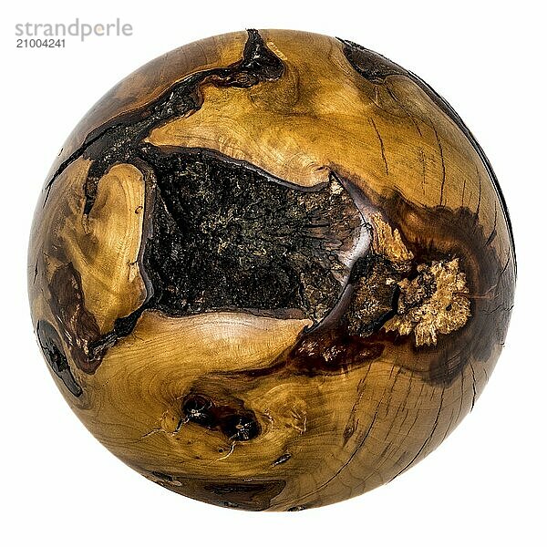 Turned dark brown ball made of wood with bark inclusions set free on white