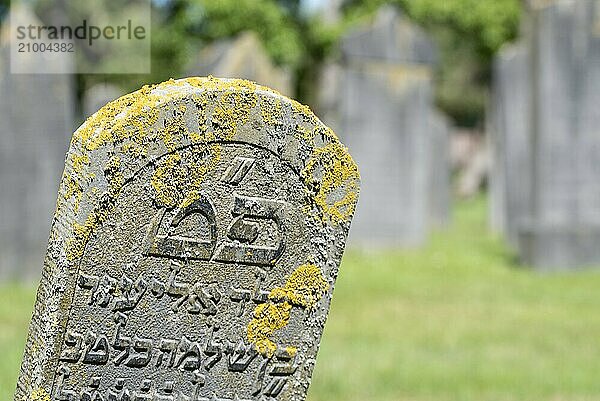 Den Helder  Netherlands  June 2022. Old dilapidated Jewish graves at the cemetery of Den Helder. Selective focus