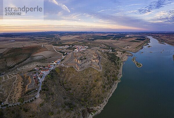 Juromenha castle  village and Guadiana river drone aerial view at sunset in Alentejo  Portugal  Europe