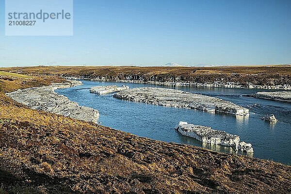 River near Urridafoss waterfall in southwest Iceland in a sunny day