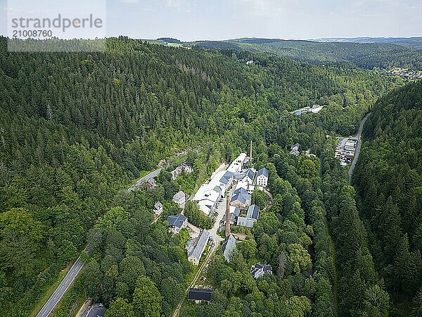 Schindler's blue colour factory is located directly on the Zwickauer Mulde river and belongs to the Zschorlau district of Albernau in the Saxon Ore Mountains. Since 2019  it has been part of the Schneeberg Mining Landscape and a UNESCO World Heritage Site in the Erzgebirge/Krušnohorí Mining Region. On 27 February 1649  the Schneeberg merchant Erasmus Schindler bought a plot of land to build a blue paint factory on the Zwickauer Mulde near Albernau. On 4 May 1649  he received the privilege to build a blue dye mill from Elector Johann Georg I. As Schindlerswerk GmbH & Co. KG  it is probably the world's oldest paint factory still in production. It is associated with a long tradition of producing blue cobalt pigments and the commercial manufacture of colour pigments. In more recent times  production has been expanded to include various paints. The company also produces laundry blue  Schindlerswerk  Zschorlau OT Albernau  Saxony  Germany  Europe