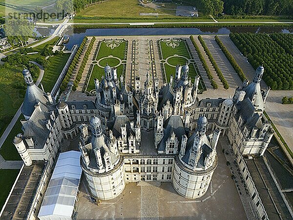 Detailed view of a historic castle from the air  with many towers and green areas all around  aerial view  Chambord Castle  Château de Chambord  Loire Castle  Loire Valley  Department Loir-et-Cher  Region Centre  France  Europe