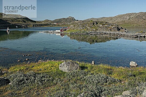 Norwegian wooden house and bridge near Honningsvag  Norway  Europe