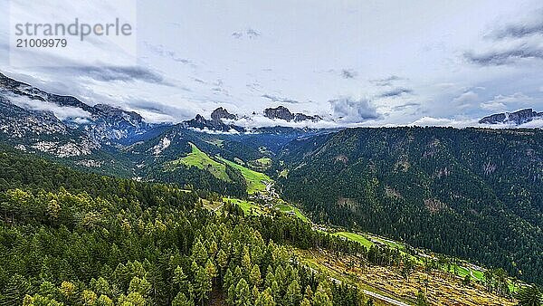 The peaks of the rose garden  shrouded in mist  drone shot  Dolomites  Autonomous Province of Bolzano  South Tyrol  Italy  Europe