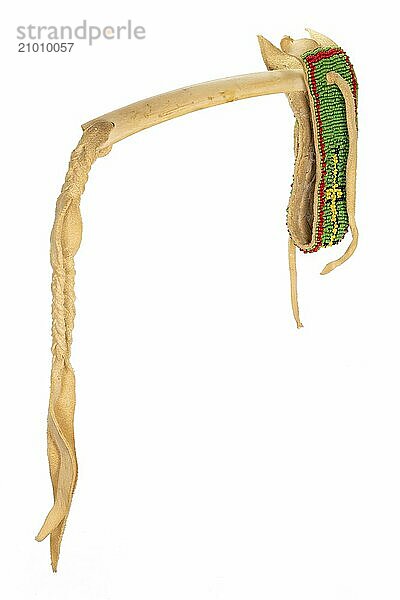 Whip of the North American Indians made of buffalo bone and leather cut out on white