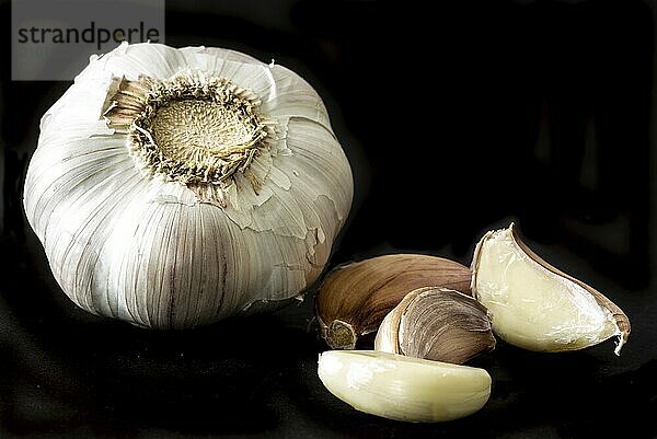 Den Helder  the Netherlands. August 3  2021. Close up of garlic bulb on a black background.