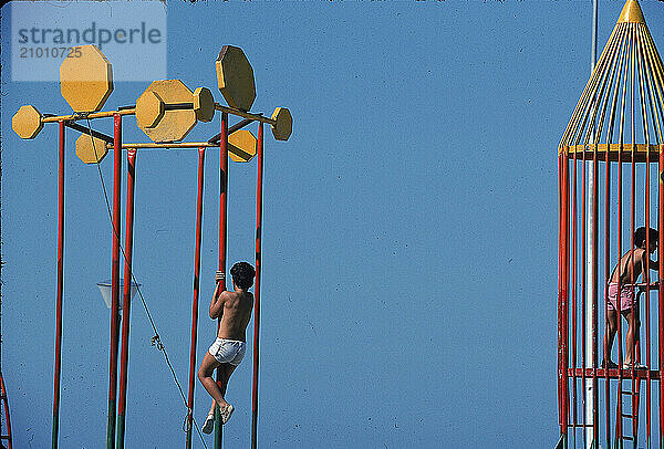 Two boys on playground in Havana  Cuba.