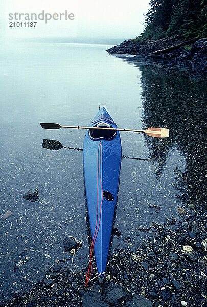 Kayak Resting in Water.