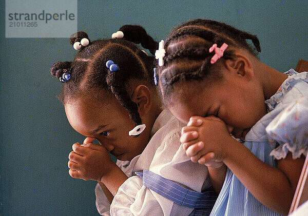 Girls Praying.