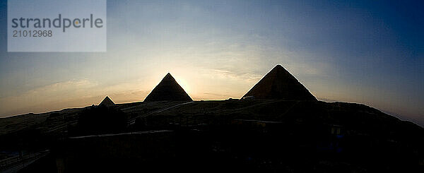 The Great Pyramids at dusk  Cairo  Egypt