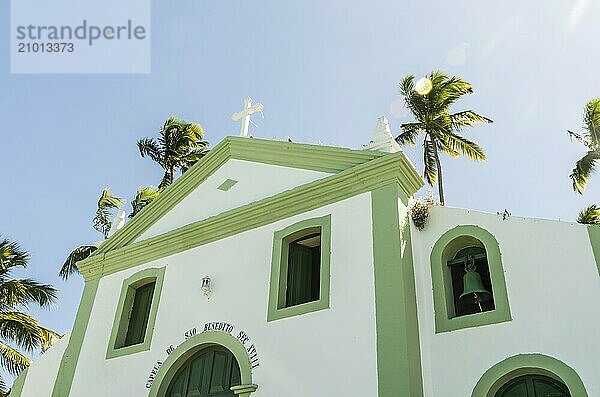 Beautiful view of (Capela de São Benedito) Chapel of St. Benedict and Carneiros Beach (Praia dos Carneiros)  Pernambuco  Brazil. Secular Chapel of Carneiros Beach. Church in the beach with palm trees