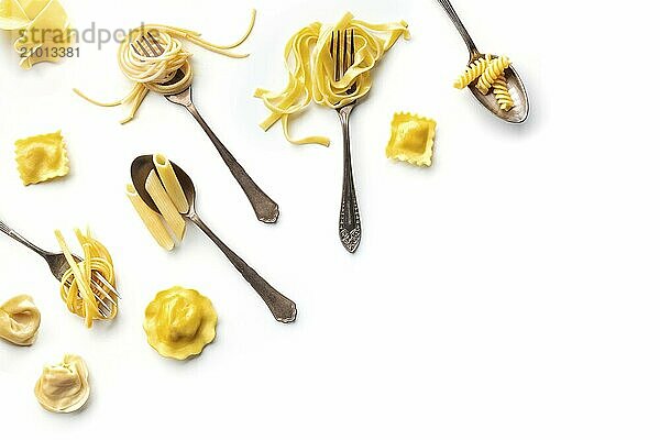 Various pasta forks. Spaghetti  fusilli  penne and other shapes of pasta  overhead flat lay shot on a white background. An assortment pasta types  with copy space  Food photography