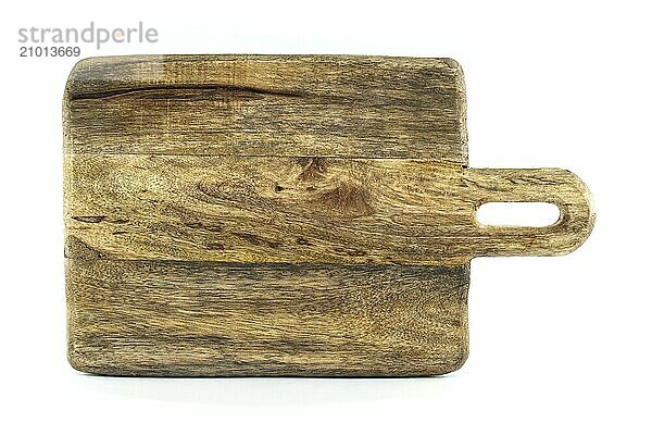 Wooden cutting board with a handle  made from old  thick wood  and bears a rustic  vintage appearance characterized by cracks  scratches  isolated on a white background