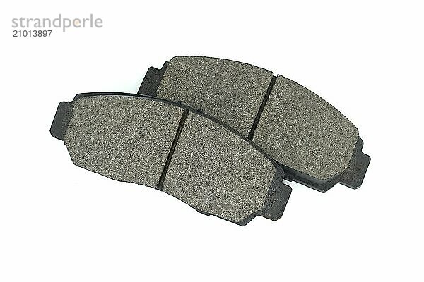 Set of auto brake pads isolated on white background  brake parts  replacement parts for vehicle