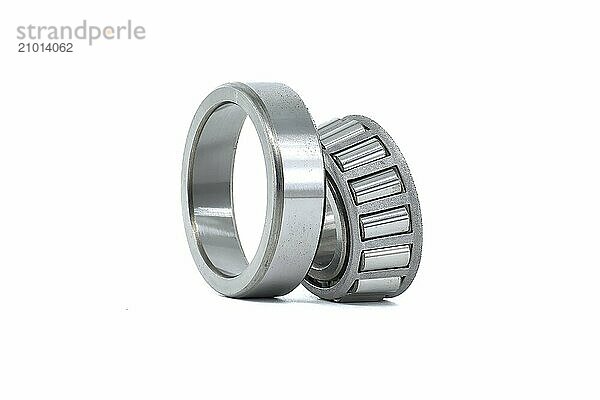 Tapered roller bearing isolated on white background. Car bearings  auto parts  automobile components for the engine and chassis suspension