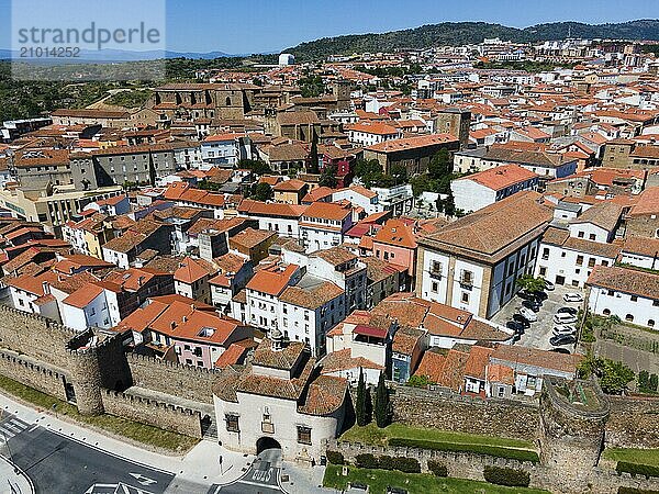 Aerial view of a city with red tiled roofs and old walls on a sunny day  aerial view  Puerta de Trujillo  city gate  city wall  Plasencia  Cáceres  Caceres  Extremadura  Spain  Europe