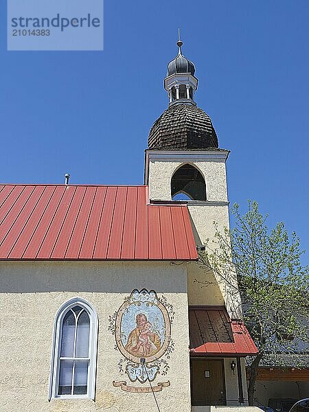 A side view of St. Joseph's catholic church on a sunny day in Leavenworth  Washington