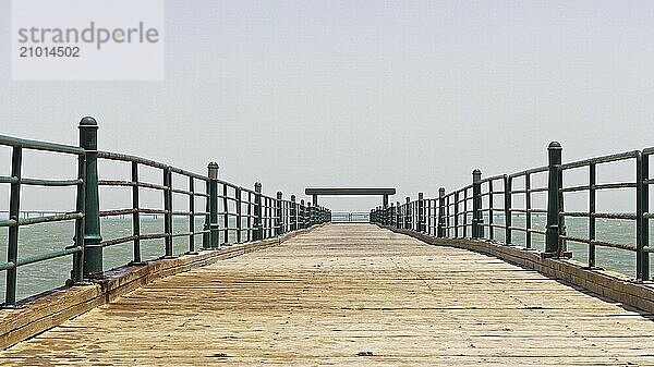 Long empty wooden pier in Kuwait