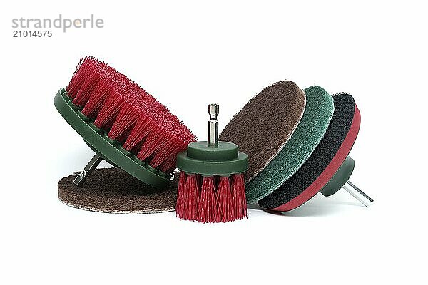 Brush attachments vith an hexagonal shal  round polishing pads with velour backing and hook and loop sanding pad isolated on white background. Sanding  cleaning and polishing accessories